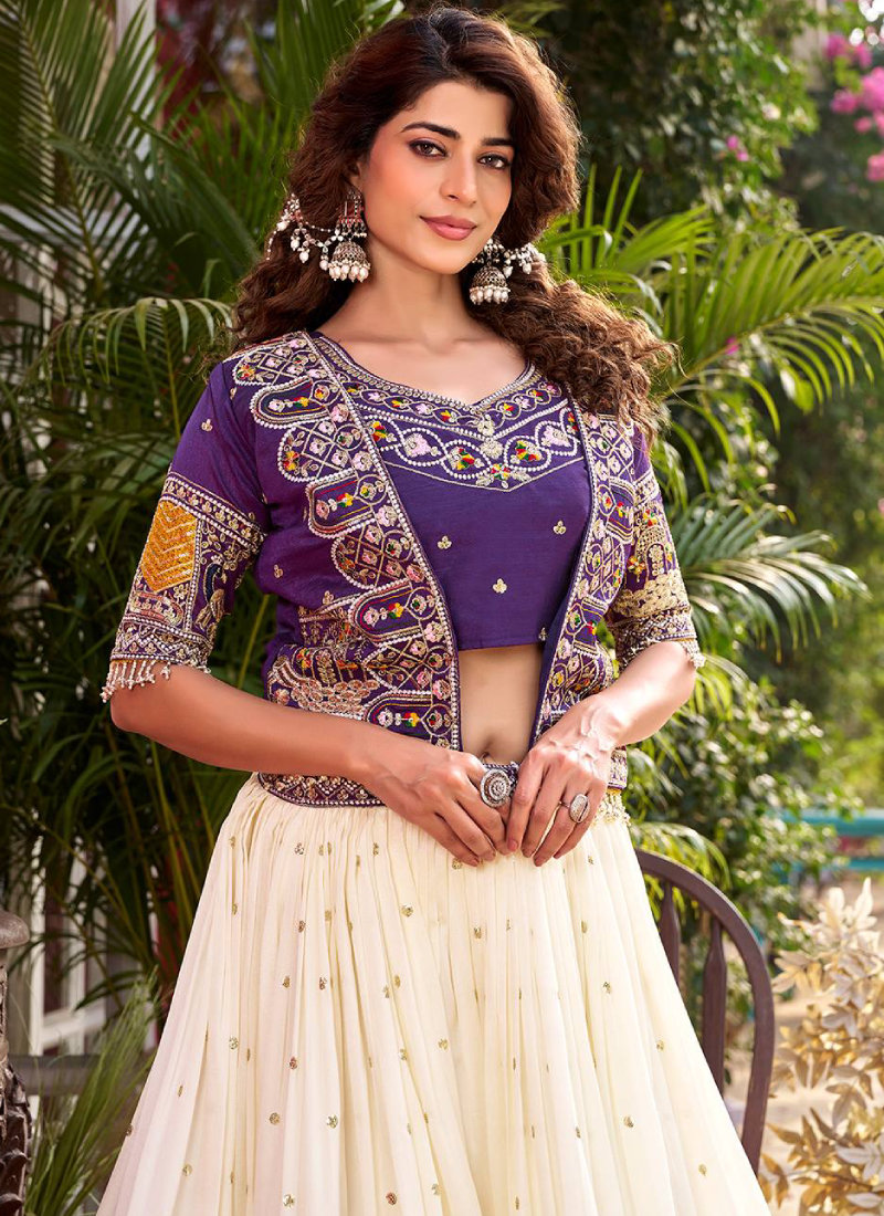Purple Heavy Embroidered Blouse And Jacket With Beige Silk Lehenga