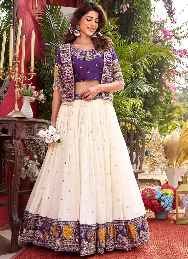 Purple Heavy Embroidered Blouse And Jacket With Beige Silk Lehenga