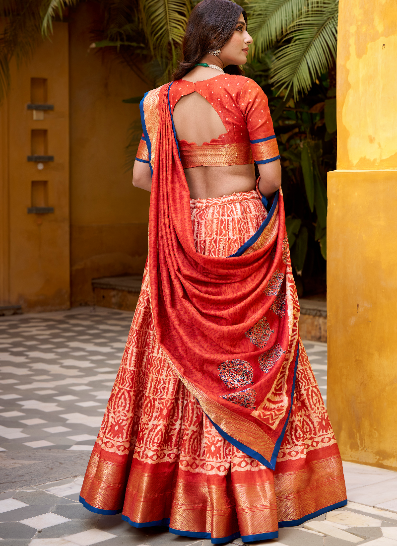Rust Orange Batik Print With Zari Weaving Work Dola Silk Lehenga Choli