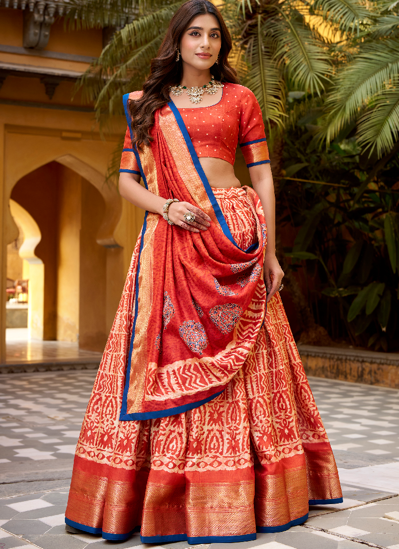 Rust Orange Batik Print With Zari Weaving Work Dola Silk Lehenga Choli