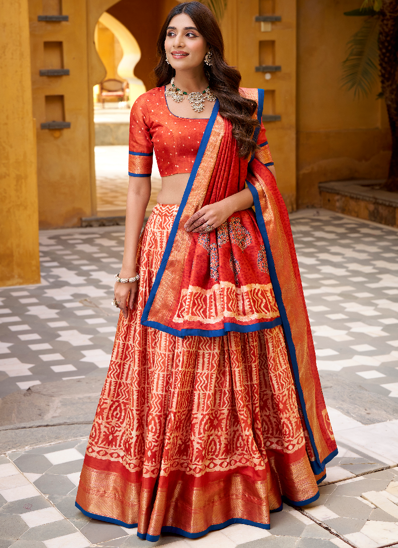 Rust Orange Batik Print With Zari Weaving Work Dola Silk Lehenga Choli