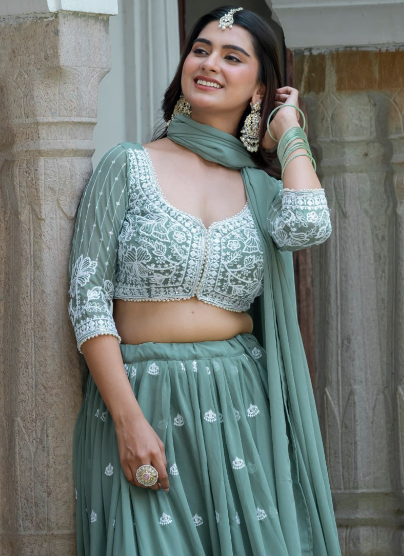 Sea Green Faux Georgette Thread Embordered With Moti Lace Lehenga Set