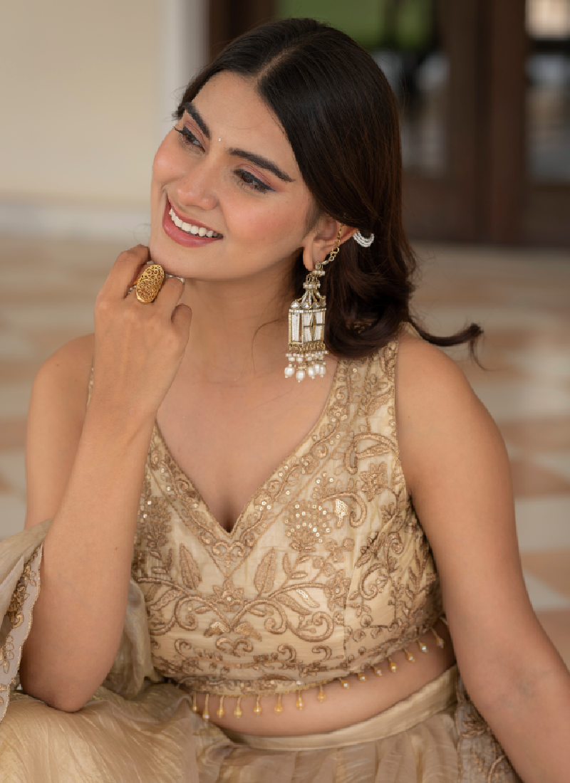 Sequence Embroidered Heavy Blouse With Golden Plain Lehenga Set