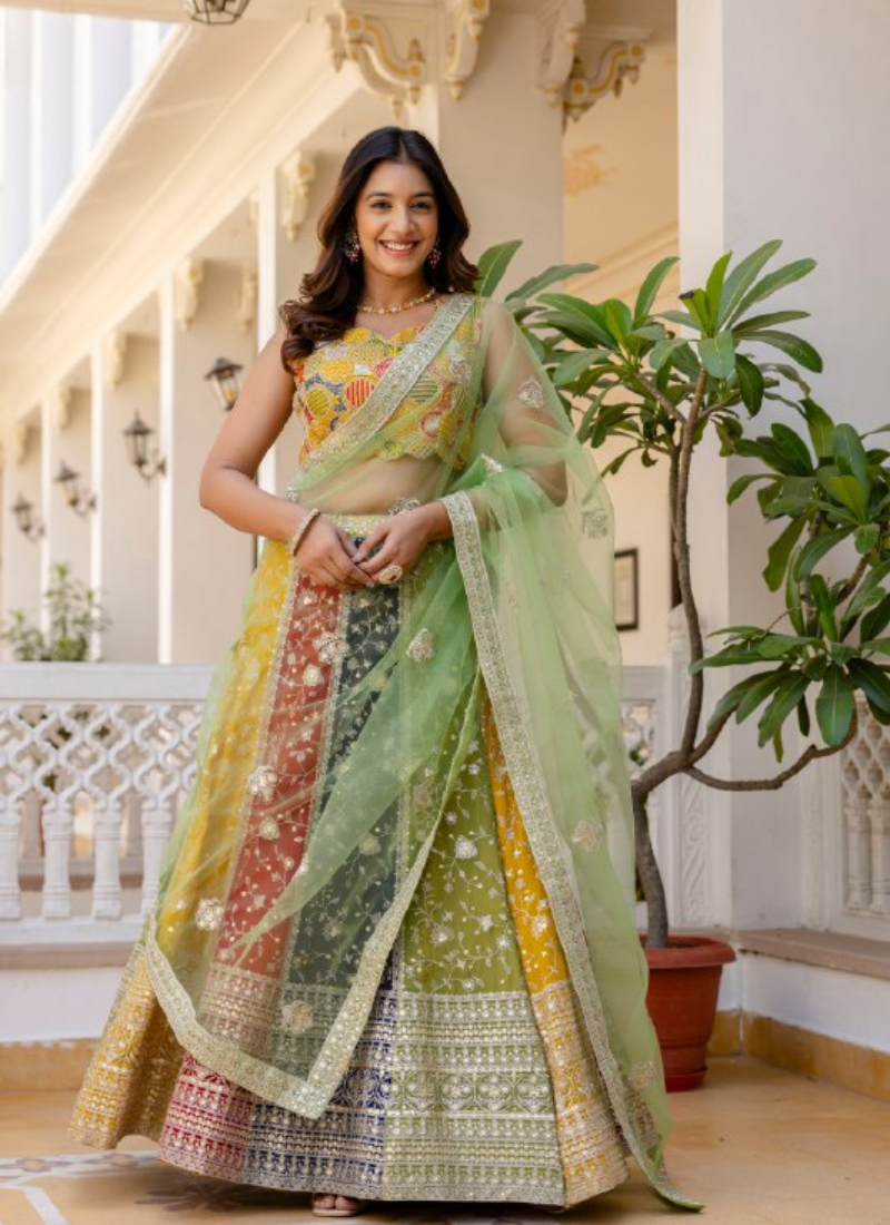 Sequence Embroidery Multi Color Georgette Wedding Wear Lehenga Choli
