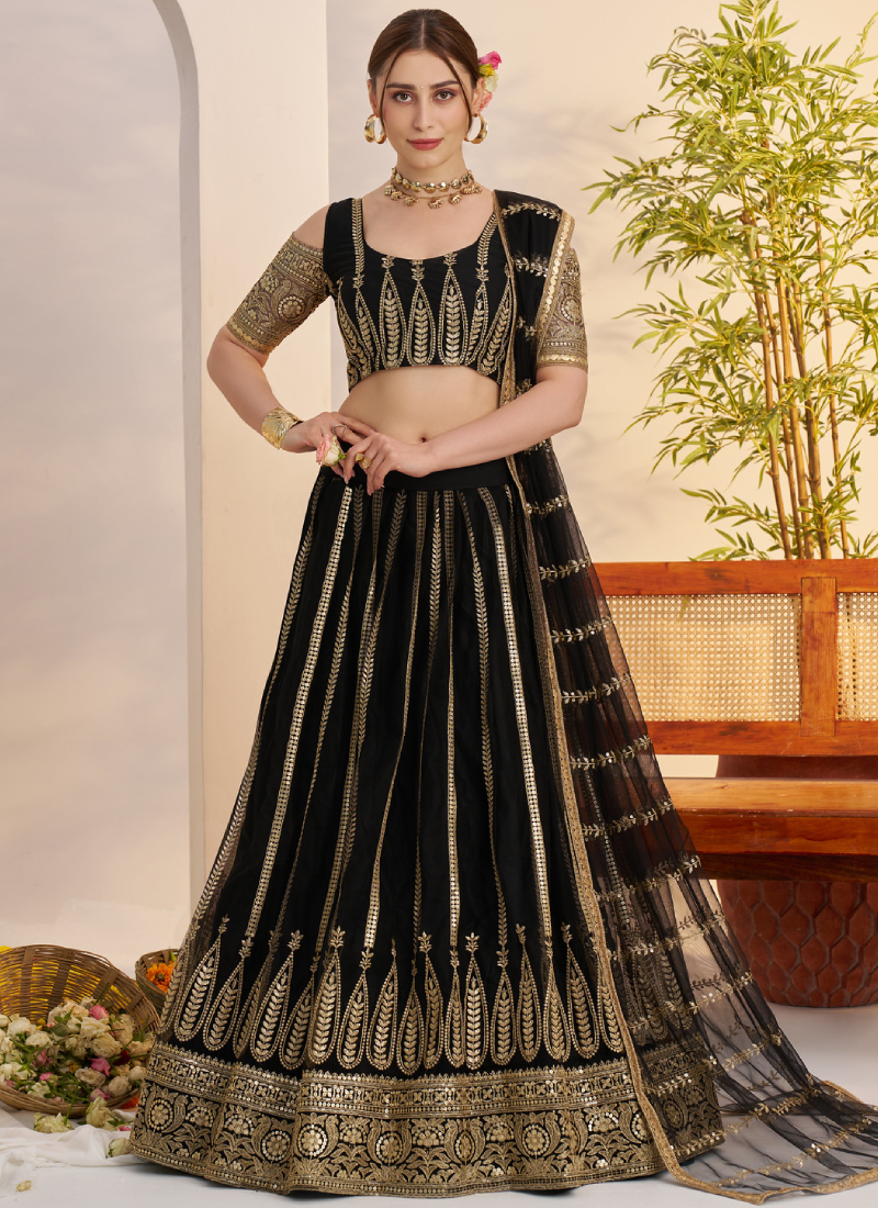Sequence Heavy Embroidered Reception Wear Net Black Lehenga Choli