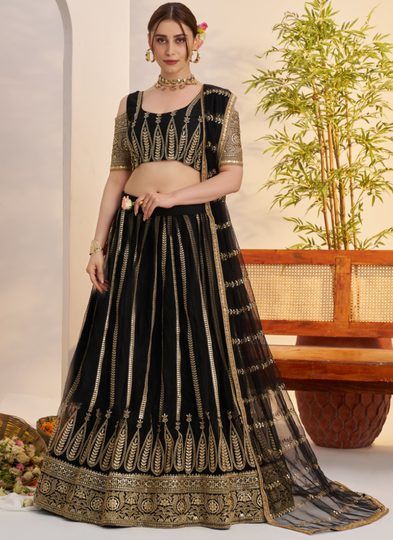 Sequence Heavy Embroidered Reception Wear Net Black Lehenga Choli
