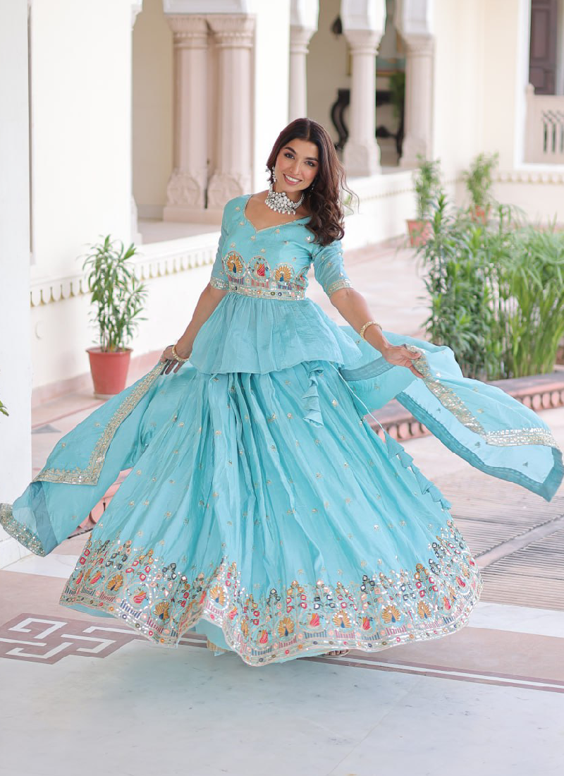 Spectacular Silk Thread Embroidered Sky Blue Lehenga With Peplum Top