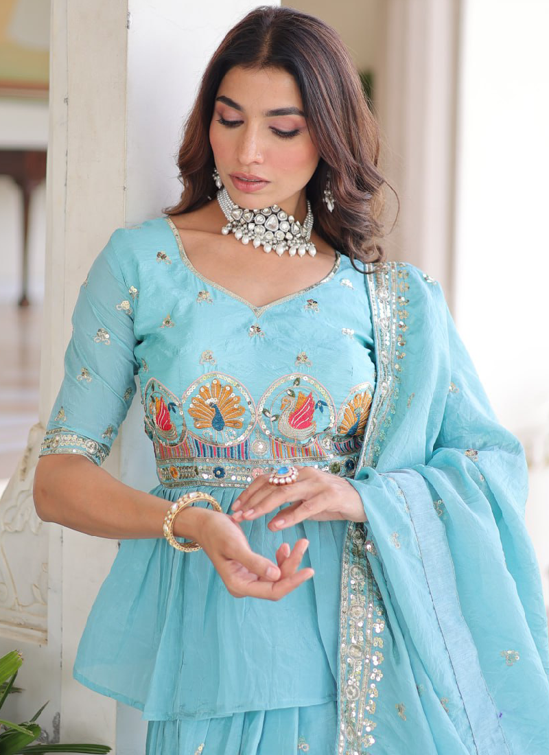 Spectacular Silk Thread Embroidered Sky Blue Lehenga With Peplum Top