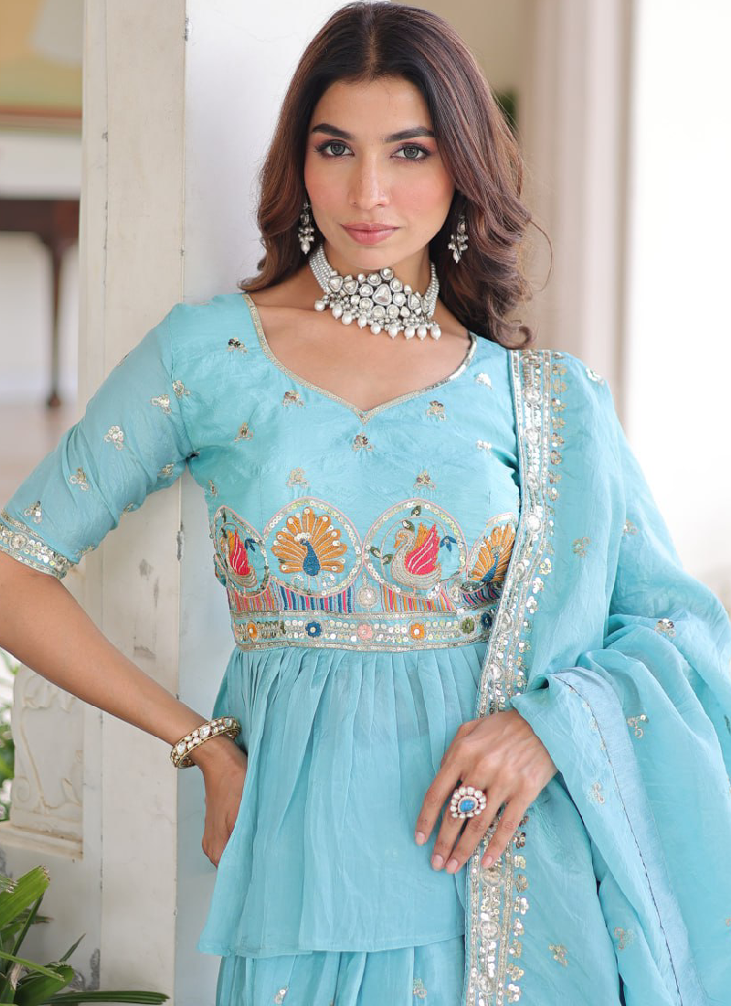 Spectacular Silk Thread Embroidered Sky Blue Lehenga With Peplum Top