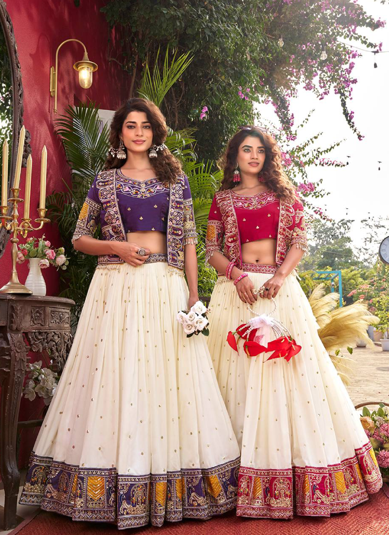 Purple Heavy Embroidered Blouse And Jacket With Beige Silk Lehenga
