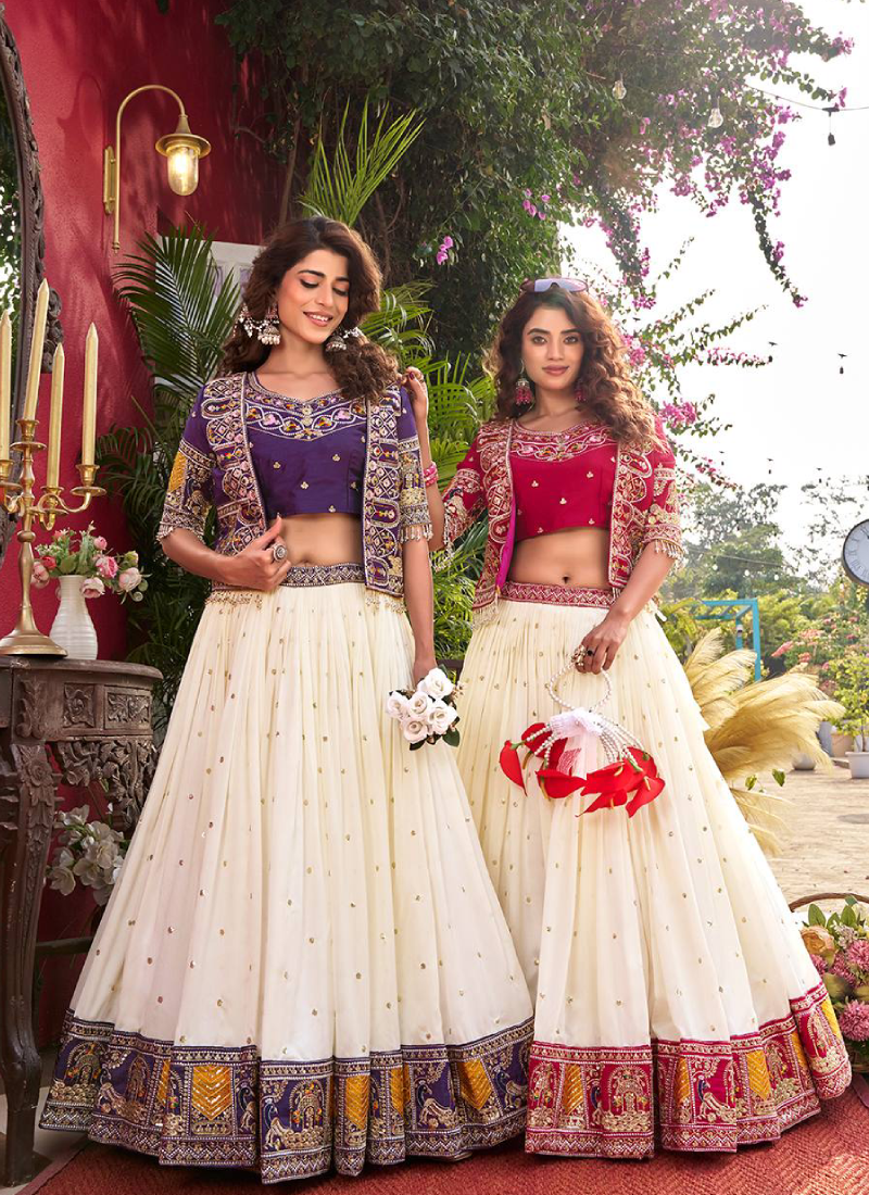 Purple Heavy Embroidered Blouse And Jacket With Beige Silk Lehenga