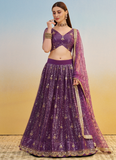 Wonderful Zari Sequence Embroidery Work Dark Purple Net Lehenga Choli