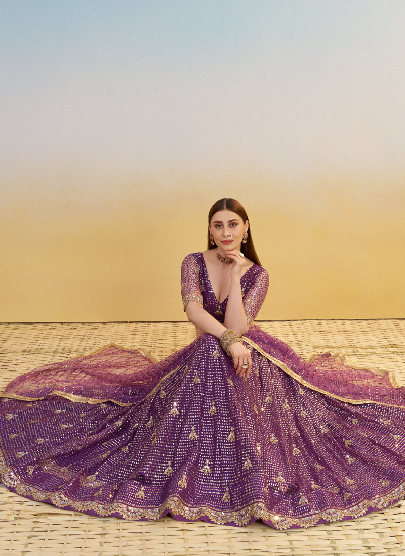Wonderful Zari Sequence Embroidery Work Dark Purple Net Lehenga Choli