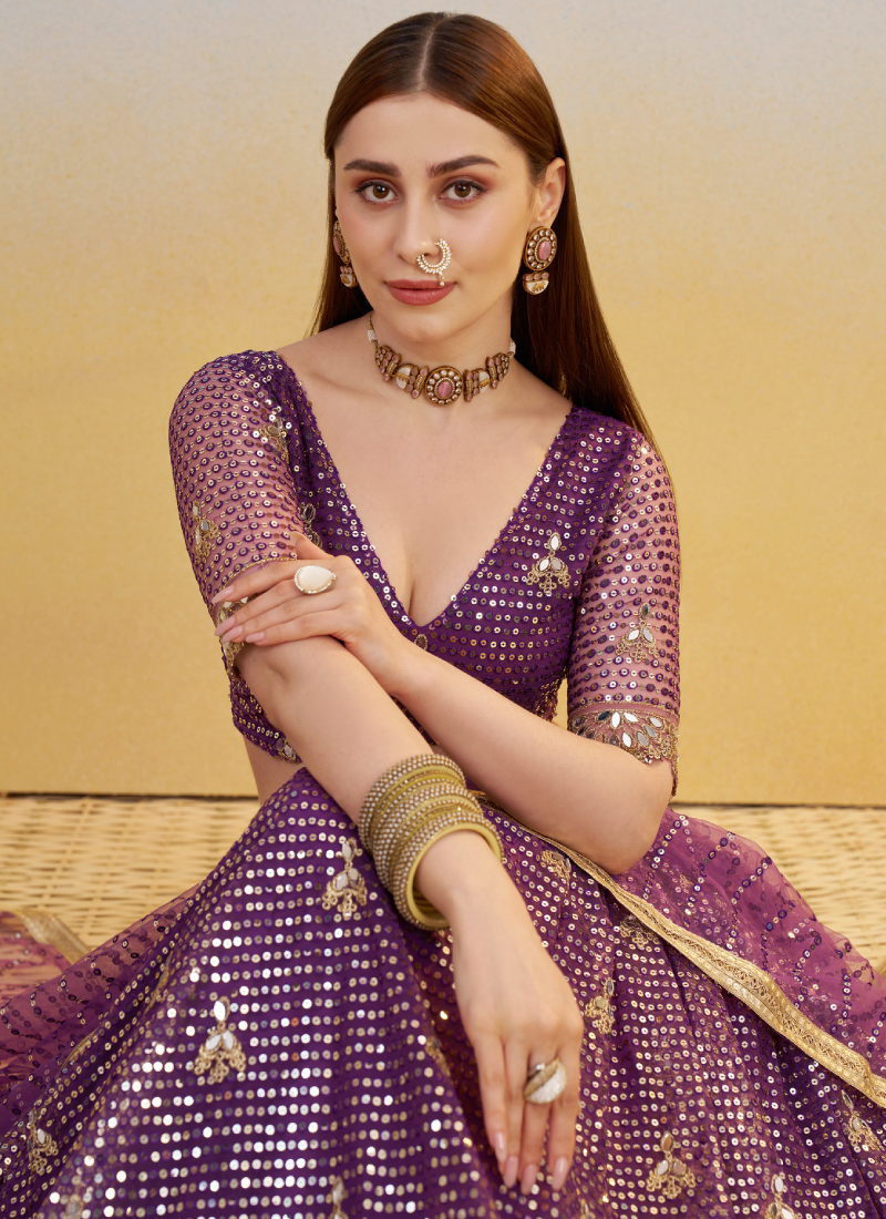 Wonderful Zari Sequence Embroidery Work Dark Purple Net Lehenga Choli
