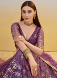 Wonderful Zari Sequence Embroidery Work Dark Purple Net Lehenga Choli