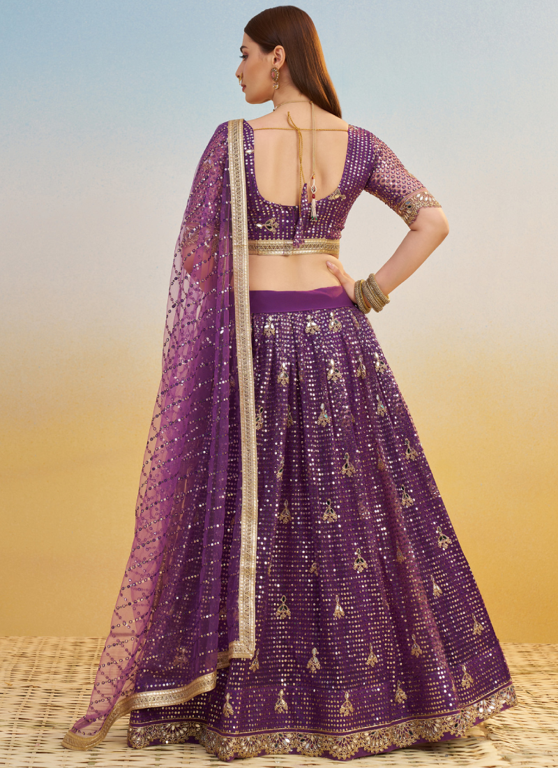 Wonderful Zari Sequence Embroidery Work Dark Purple Net Lehenga Choli