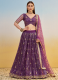 Wonderful Zari Sequence Embroidery Work Dark Purple Net Lehenga Choli