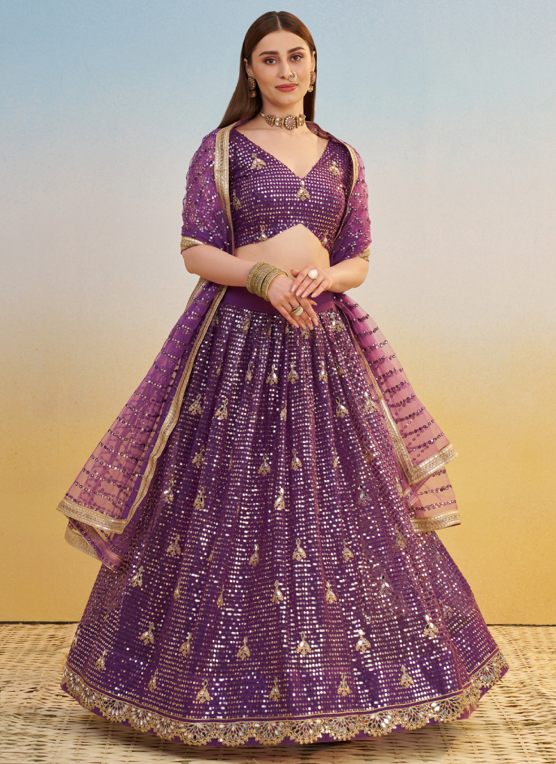 Wonderful Zari Sequence Embroidery Work Dark Purple Net Lehenga Choli