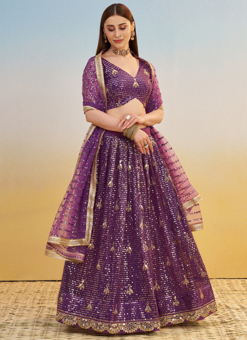 Wonderful Zari Sequence Embroidery Work Dark Purple Net Lehenga Choli