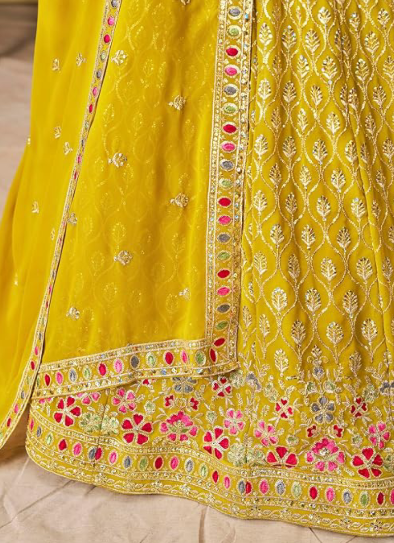 Yellow Georgette Heavy Thread Embroidered Lehenga Choli For Function