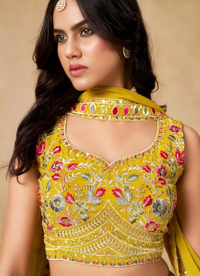 Yellow Georgette Heavy Thread Embroidered Lehenga Choli For Function