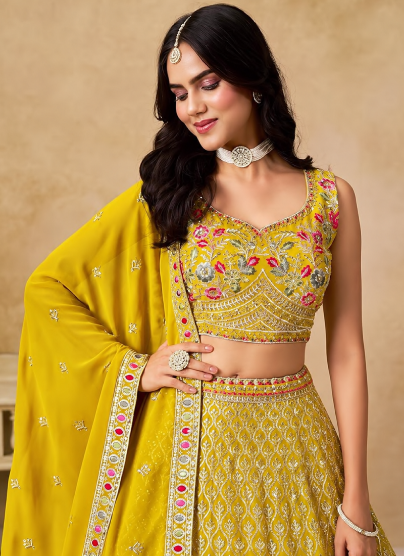 Yellow Georgette Heavy Thread Embroidered Lehenga Choli For Function