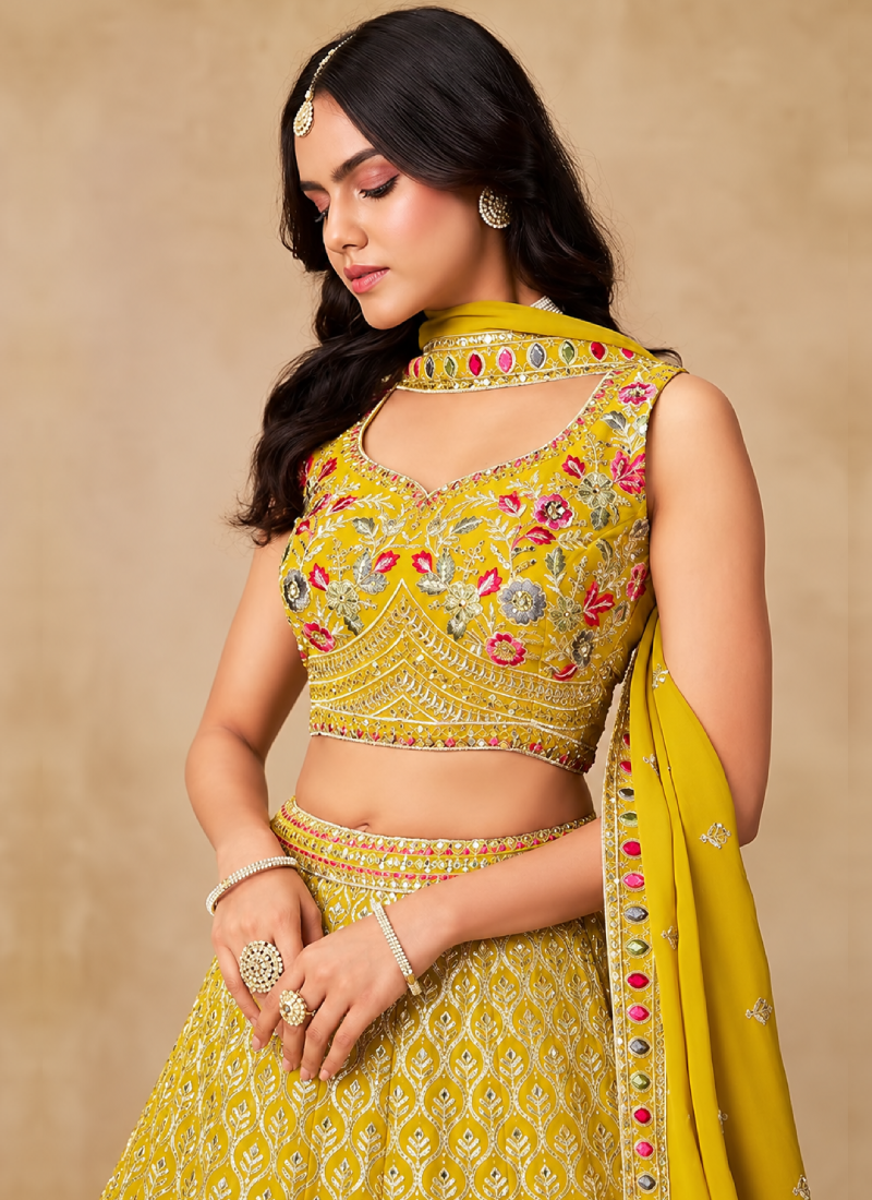 Yellow Georgette Heavy Thread Embroidered Lehenga Choli For Function