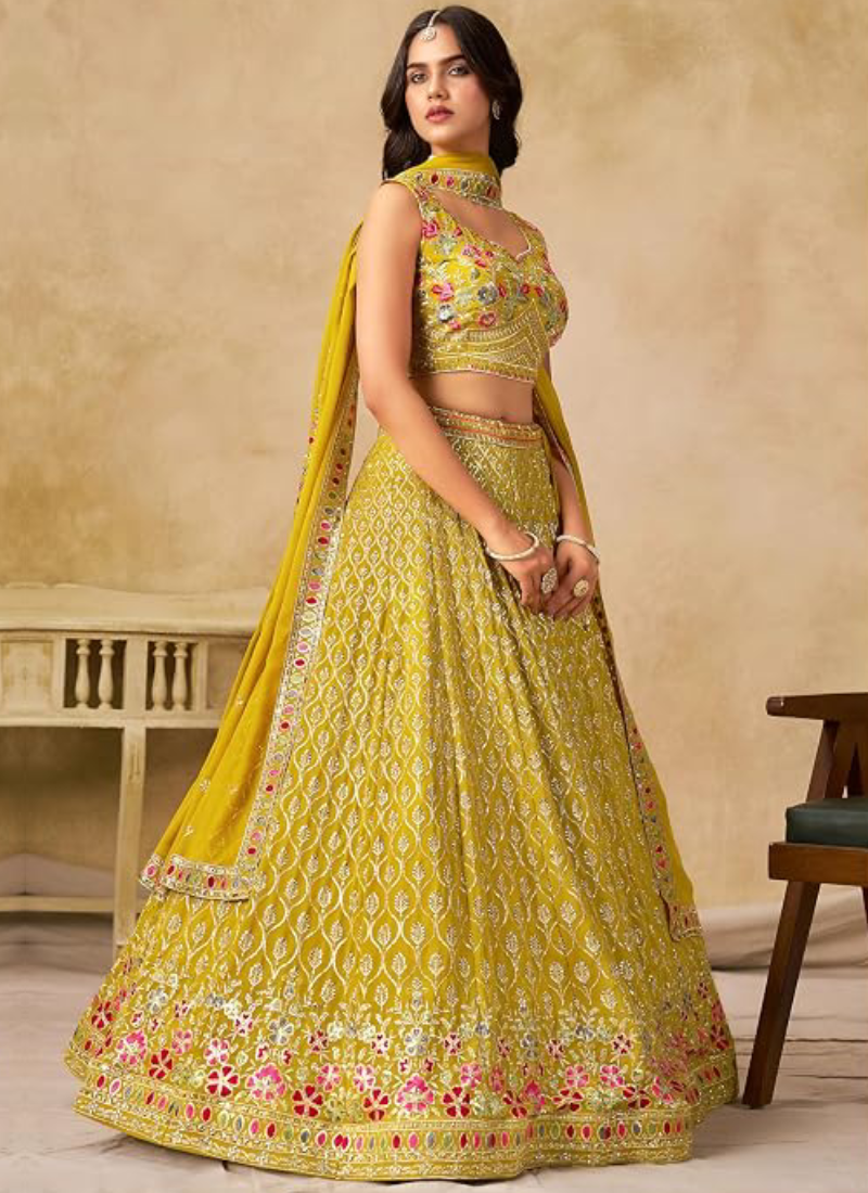 Yellow Georgette Heavy Thread Embroidered Lehenga Choli For Function