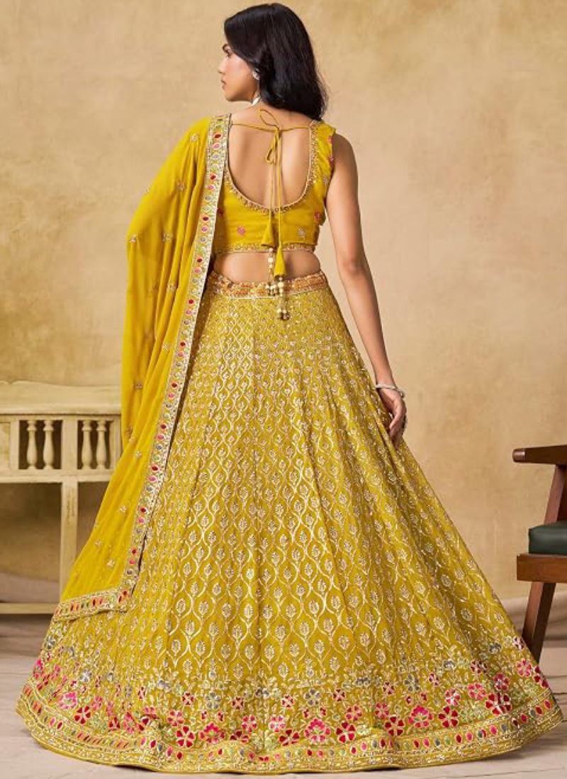 Yellow Georgette Heavy Thread Embroidered Lehenga Choli For Function
