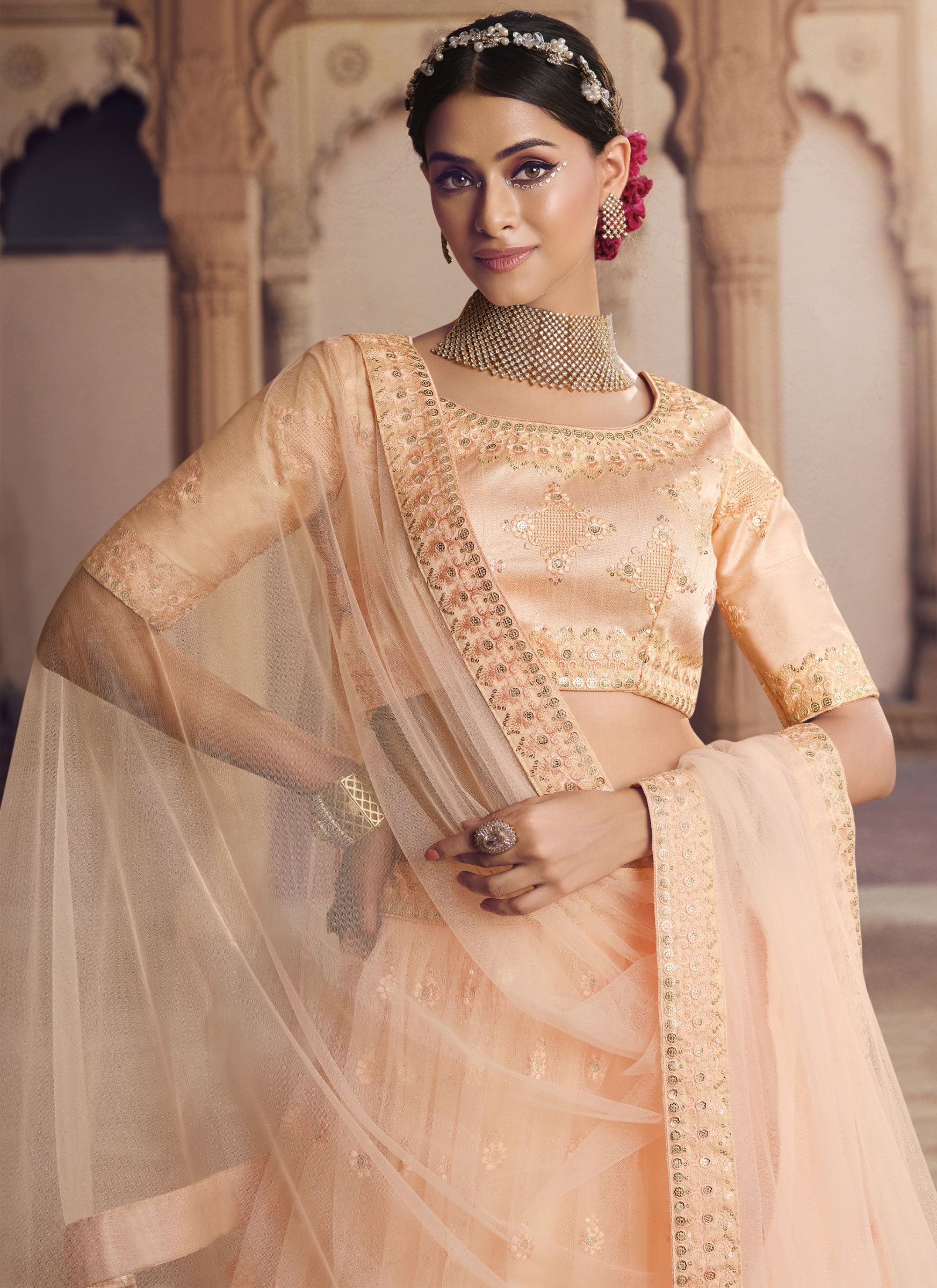 Designer Light Orange Viscose Thread Simple Net Lehenga Designs