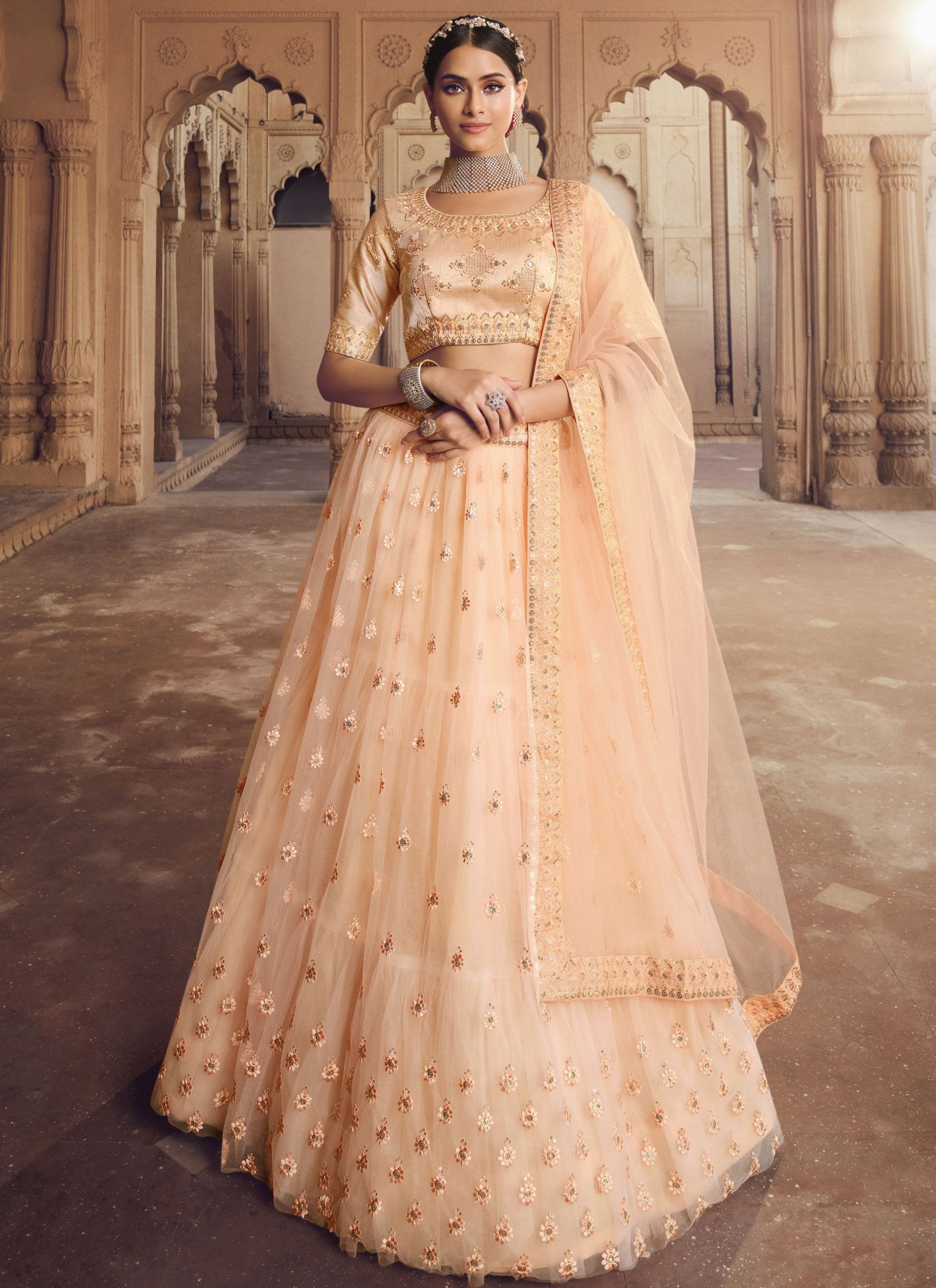 Designer Light Orange Viscose Thread Simple Net Lehenga Designs